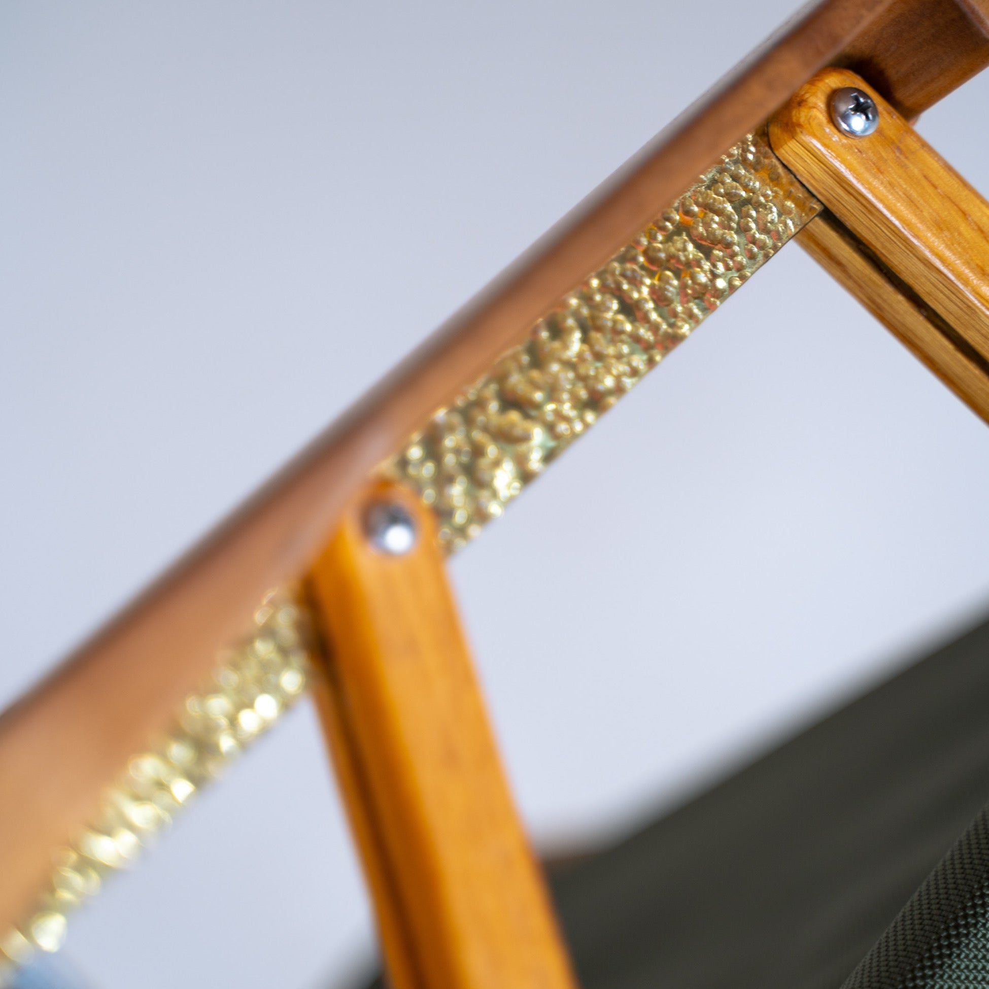 The Masterpiece Hand-Hammered Brass Hardware Set for Kermit Chair