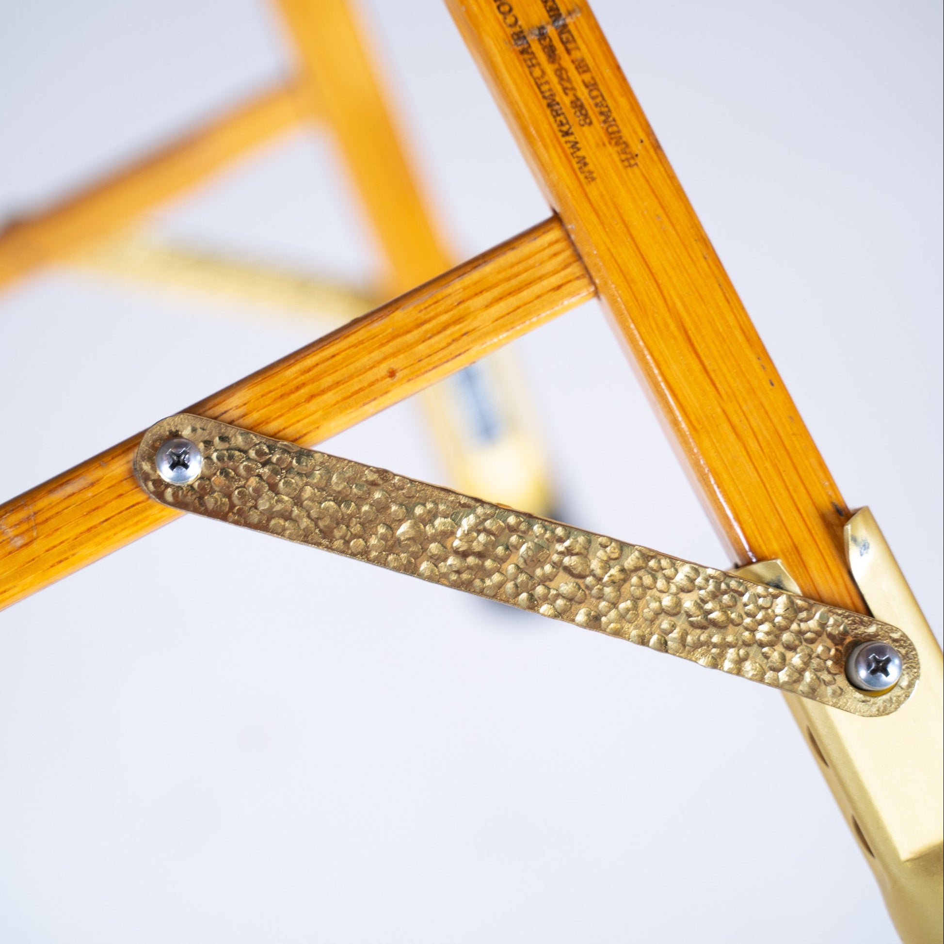 The Masterpiece Hand-Hammered Brass Hardware Set for Kermit Chair